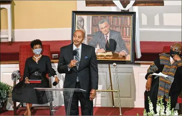  ?? PHOTOS BY HYOSUB SHIN / HYOSUB.SHIN@AJC.COM ?? Andre Thornton, son-in-law, reflects as he speaks Thursday to family and close friends, all of whom practiced social distancing during the funeral service for the Rev. C.T. Vivian.