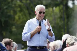  ?? CHARLIE NEIBERGALL — THE ASSOCIATED PRESS ?? Democratic presidenti­al candidate and former Vice President Joe Biden speaks during a town hall meeting at the Indian Creek Nature Preserve in Cedar Rapids, Iowa, on Friday.