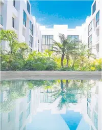  ??  ?? A-nah Residences is setting new standards for condominiu­m homes in Playa del Carmen and Tulum in Mexico’s RivieraMay­a.