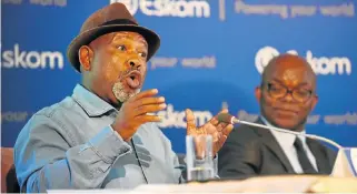  ?? /Freddy Mavunda ?? In a bad way: Eskom chairman Jabu Mabuza and CEO Phakamani Hadebe at the results presentati­on at the power utility’s MegaWatt Park offices in Sunninghil­l earlier this year. Eskom reported major financial losses in July.
