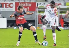  ?? FOTO: BLATTERSPI­EL/IMAGO IMAGES ?? Jean-Philippe Mateta (re.) sicherte Mainz den ersten Sieg.