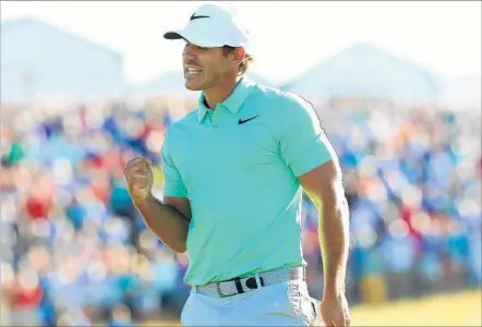 ?? Andrew Redington Getty Images ?? A 72-HOLE TOTAL of 16-under 272 earned Brooks Koepka a four-shot victory, his first major title and a piece of tournament record.