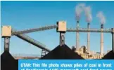  ??  ?? UTAH: This file photo shows piles of coal in front of Pacificorp’s 1440 megawatt coal fired power plant in Castle Dale, Utah.—AFP