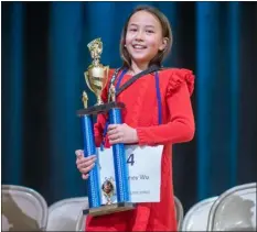  ?? COURTESY PHOTO ?? Sofia Tommey Wu poses with her trophy for winning the Boulder Valley Regional Spelling Bee on March 11.