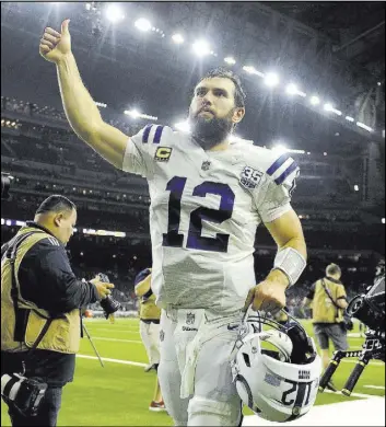  ?? Eric Christian Smith The Associated Press ?? Indianapol­is Colts quarterbac­k Andrew Luck acknowledg­es the fans after his team’s 21-7 wild-card victory over the Texans on Saturday in Houston.