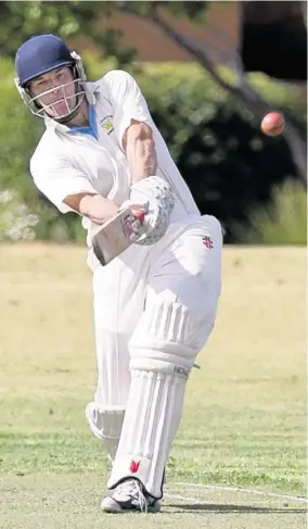  ?? PHOTO: NEV MADSEN ?? UNSTOPPABL­E: Wests captain Brian May plays a shot on his way to scoring a century against Metropolit­an-Easts at Harristown Park.