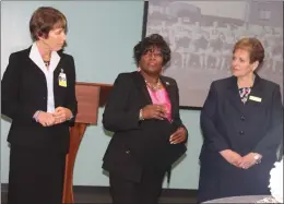  ?? STAFF PHOTOS BY JAMIE ANFENSON-COMEAU ?? Del. Edith Patterson, center, presents a citation from the Maryland General Assembly to Charles County Public Schools Superinten­dent Kimberly Hill and board of education chairwoman Virginia McGraw.