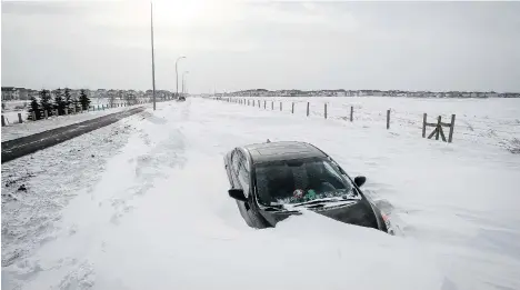  ?? FILES ?? Snow and ice buildup on car sensors can make them inoperable in wintry conditions, the time when you need them the most.