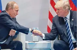  ??  ?? Isolated: Mr Trump is seeking closer relations with Mr Putin