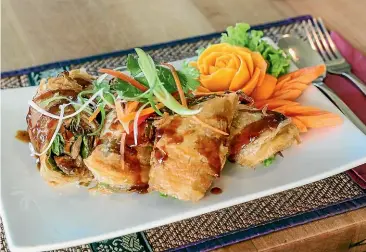  ??  ?? Duck roti is one of Chokdee’s most popular dishes, but the experience­d chefs are always working on creating new dishes.