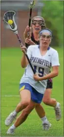  ?? PETE BANNAN — DIGITAL FIRST MEDIA ?? Alyssa Long (19) was a key factor in Springfiel­d’s defensive effort Tuesday as the Cougars mauled Exeter, 15-5, to open the PIAA Class 3A girls lacrosse tournament.
