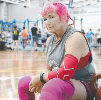  ?? Pictures: TERTIUS PACKARD ?? Logan’s Valerie Silver, 69, at the Pan Pacific Masters Games weightlift­ing and agility event at Carrara yesterday and (inset) Kim and Bill Setiu.