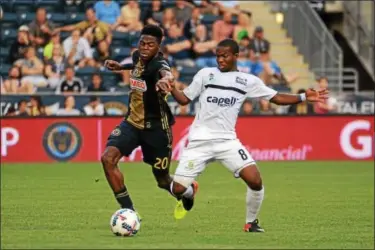  ?? FOR DIGITAL FIRST MEDIA -- MIKE REEVES ?? Union midfielder Marcus Epps, left, tries to get by Harrisburg City midfielder Mouhammed Dabo Wednesday night at Talen Energy Stadium. Epps got his first start and scored his first goal in the 3-1 win over the Islanders in the fourth round of the U.S....