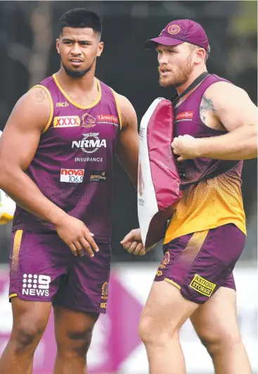  ??  ?? ENGINE ROOM: Payne Haas (left) and Matt Lodge (right) during Brisbane Broncos training