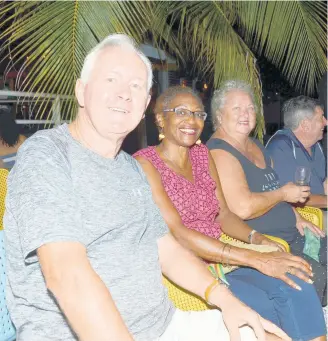  ??  ?? Movie lovers smile for Hospitalit­y Jamaica’s camera during Skylark Film Nights in Negril on Saturday night.