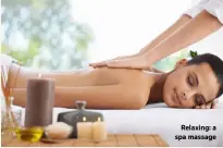  ??  ?? Relaxing: a spa massage