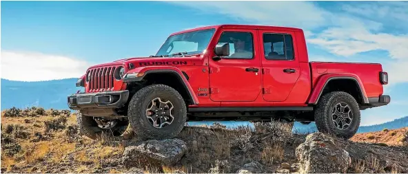  ??  ?? The Gladiator is pretty much exactly what you would expect – and want – a Jeep pick-up to look like.