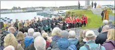  ?? 25_c19HRHIsla­y122 ?? The Islay Gaelic Choir at the service in Port Ellen.