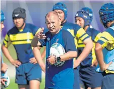  ??  ?? Eddie Jones put some Japanese junior players through their paces.