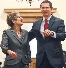  ?? TARA WALTON/ TORONTO STAR FILE PHOTO ?? In 2013, incoming premier Kathleen Wynne says goodbye to her predecesso­r, Dalton McGuinty, after meeting in the premier's office.