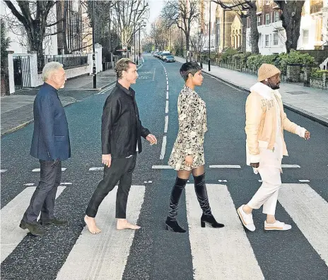  ??  ?? THE Voice UK’s judges took part in a traffic-stopping photoshoot at Abbey Road ahead of this weekend’s “Battle Round” on the singing contest.
Jennifer Hudson, Will.i.am, Sir Tom Jones and Gavin Rossdale visited Abbey Road Studios in St John’s Wood,...