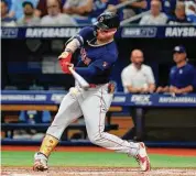  ?? Mike Ehrmann/Getty Images ?? The Boston Red Sox’s Alex Verdugo hits during a game against the Tampa Bay Rays at Tropicana Field on July 12 in St Petersburg, Fla.