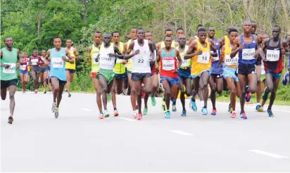  ??  ?? Marathoner­s competes in the previous edition of the 10 kilometer Okpekpe Internatio­nal Road Race