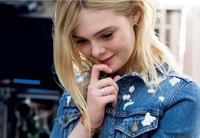  ??  ?? RHAPSODY IN BLUE Tiffany brand ambassador Elle Fanning effectivel­y released her first single—she sang the remixed Moon River campaign soundtrack, which is available on Spotify