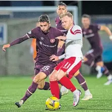  ??  ?? East Fife’s Scott Agnew battles with Jamie Brandon.