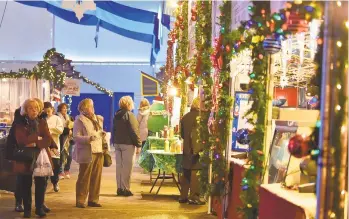  ?? APRIL GAMIZ / THE MORNING CALL ?? ArtsQuest's Christkind­lmarkt in Bethlehem, which runs weekends through Dec. 23, is one of the many holiday attraction­s presented by nonprofits and small businesses in the Christmas City.