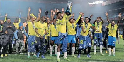  ?? BackpagePi­x ?? MAMELODI Sundowns celebrated winning a sixth consecutiv­e Premiershi­p title last week.