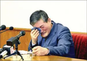  ?? KCNA VIA KNS/AFP ?? Kim Dong-chul, a Korean-American, cries as he addresses a news conference in Pyongyang in March 2016.