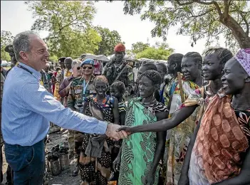  ??  ?? David Shearer, head of the UN mission in South Sudan, meets displaced families in the Pibor camp. ‘‘Generally, everywhere we go, people receive David really well,’’ says Lt Col Brent Quinn.