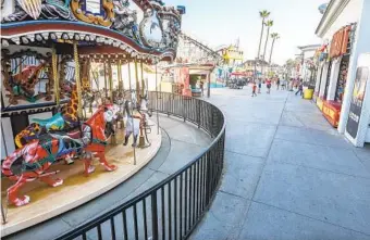  ?? EDUARDO CONTRERAS U-T ?? Pandemic-related closures have shuttered or slowed attraction­s such as at Belmont Park on Wednesday.