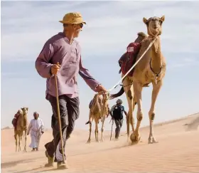  ??  ?? Evans and his team faced challenges including heavy sandstorms, extreme climate changes and temperamen­tal camels.