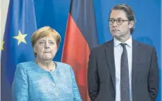  ?? FOTO: IMAGO ?? Bundeskanz­lerin Angela Merkel (CDU) und Verkehrsmi­nister Andreas Scheuer (CSU) waren noch vor dem Dieselgipf­el mit den Konzernbos­sen am Sonntagabe­nd nicht einig, wie es weitergehe­n soll.