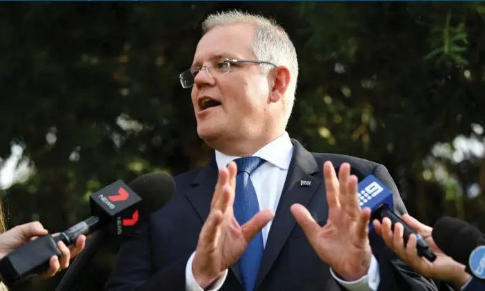  ?? Photograph: Morgan Sette/AAP ?? The treasurer, Scott Morrison, says he will be ‘very forward leaning’ in terms of arguing for religious protection­s if Australian­s vote in favour of marriage equality.