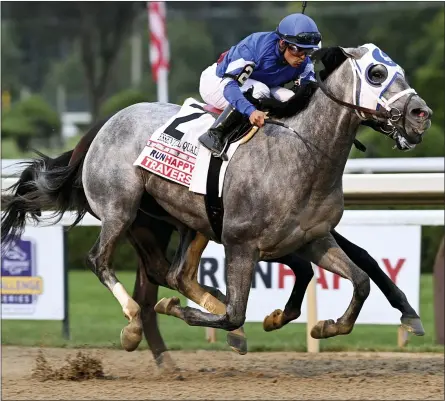  ?? ADAM COGLIANESE - THE ASSOCIATED PRESS ?? In a photo provided by the New York Racing Associatio­n, Essential Quality, with jockey Luis Saez, wins the Travers Stakes horse race Saturday, Aug. 28, 2021, at Saratoga Race Course in Saratoga Springs, N.Y.