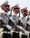  ?? AFP ?? Iranian soldiers march during the annual military parade.