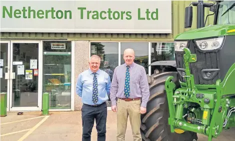  ??  ?? Managing director Harry Barclay, left, and general manager Garry Smith of Netherton Tractors.