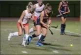  ?? THOMAS NASH — DIGITAL FIRST MEDIA ?? Owen J. Roberts’ Sophia Murray (24) and Hershey’s Madeleine Zimmer (8) give chase to a loose ball during the first half of Tuesday’s state playoff game.