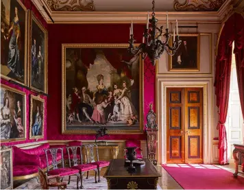 ?? ?? Fig 9: The Red Drawing Room is dominated by Sir Joshua Reynolds’s portrait of the 4th Duke and family. Most of the important historic collection was sold in the 1880s