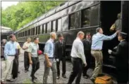  ?? JOHN STRICKLER — DIGITAL FIRST MEDIA ?? Members of the Montgomery County Planning Commission along with county and Pottstown officials board the Colebrookd­ale Railroad train for a ride by rail into Pottstown as part of Wendesday’s tour.