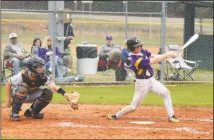  ?? The Sentinel-Record/Grace Brown ?? SWING LOW: Fountain Lake’s Connor Webb (4) swings at a pitch against visiting Malvern Monday night. Malvern is scheduled to travel to Bismarck today, while Fountain Lake is scheduled to host Episcopal Collegiate on Thursday.