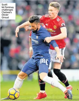  ??  ?? Scott McTominay challenges Chelsea’s Olivier Giroud