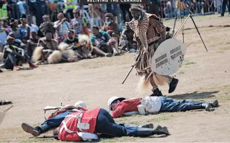  ?? See Page 3 ?? THE commemorat­ion of the Anglo-zulu War in isandlwana, Nquthu, took place yesterday where the regiment of the Royal Welsh and Zulu warriors re-enacted the scene from 1879. The event was hosted by the Zulu Royal Household and sponsored by the Inkatha Freedom Party-led municipali­ties. | KHAYA NGWENYA African News Agency (ANA)