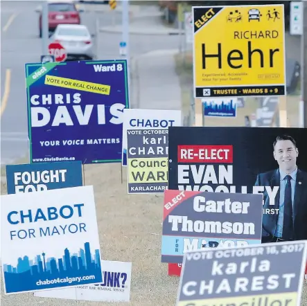  ?? LEAH HENNEL ?? These signs, seen along 38th Avenue S.W. on Friday, reflect some of the many choices Calgarians will face in Monday’s civic election.