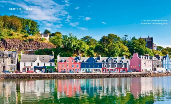  ?? ?? Colourful buildings line the harbour in Tobermory, Mull