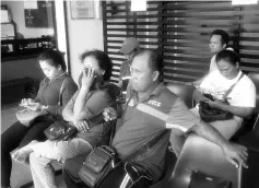  ??  ?? Sindam’s parents await the completion of the post mortem at the Sarawak General Hospital yesterday.