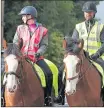  ??  ?? Officers on horseback